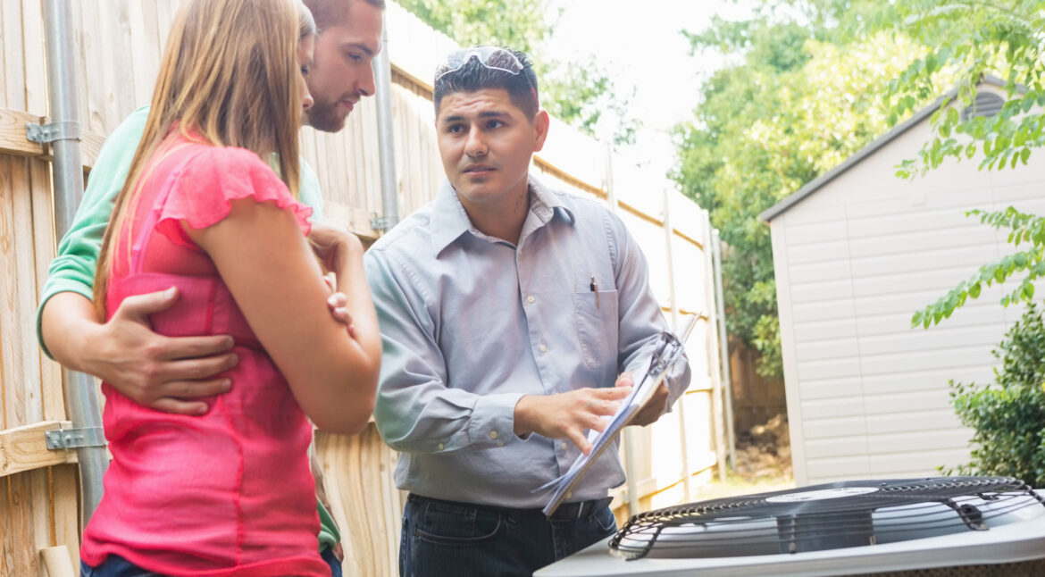 HVAC 911 | HVAC Contractor Referral Service | HVAC Tech Showing Customers New System And Going Over Instructions | HVAC Installation, Maintenance, Repair